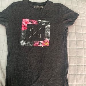 Aeropostale t-shirt. Kinda tighter fitting then regular T-shirt’s do.